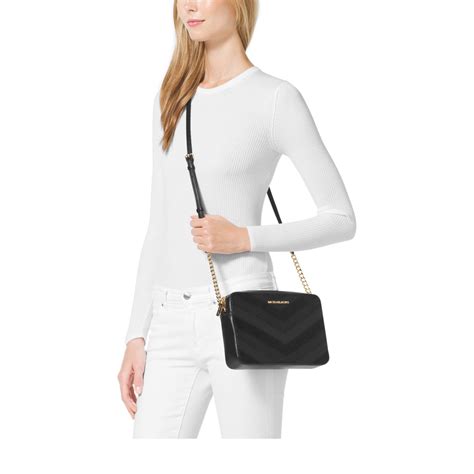 michael kors jet set travel large phone crossbody bag|Michael Kors mobile phone bag.